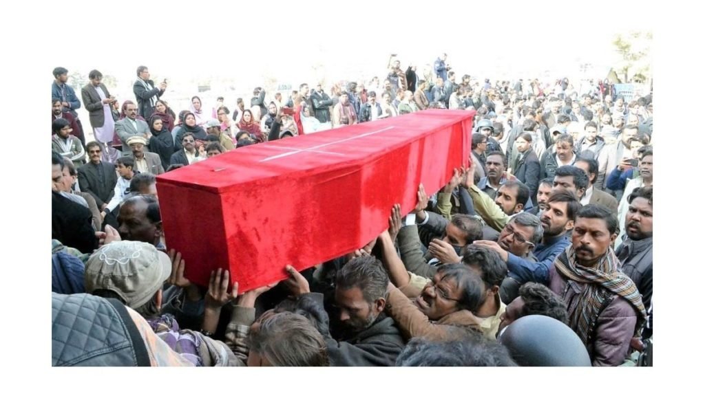 Mourners carrying coffin of one of the dead Christians in church attack